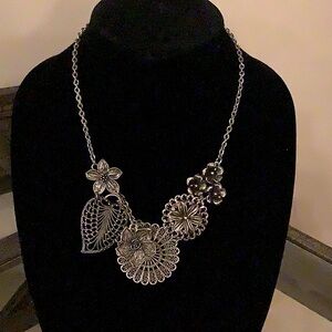 Black and silver tone necklace.